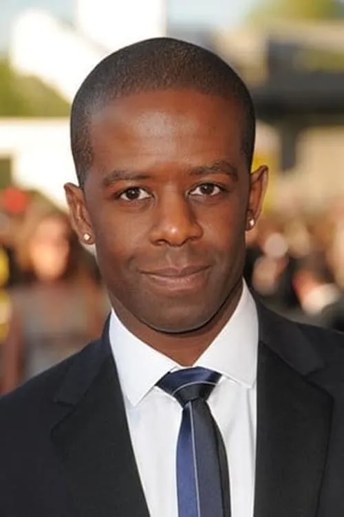 Adrian Lester interpretando a Scott