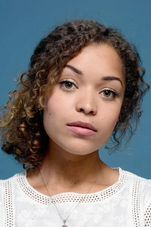 Antonia Thomas interpretando a Adrienne