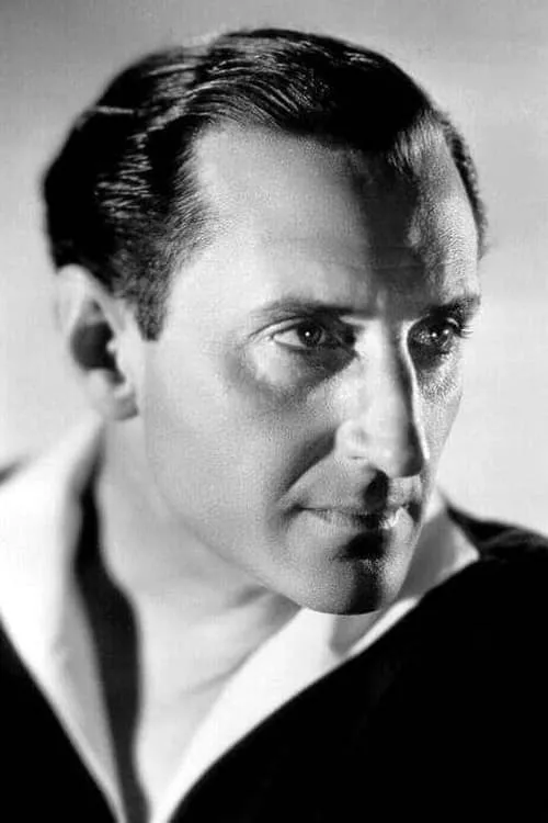 Basil Rathbone interpretando a Sherlock Holmes