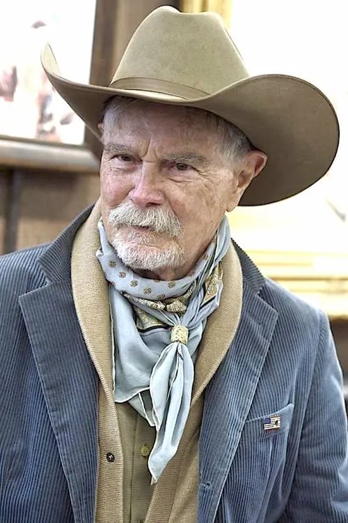 Buck Taylor interpretando a Marshal Trevor Cooper