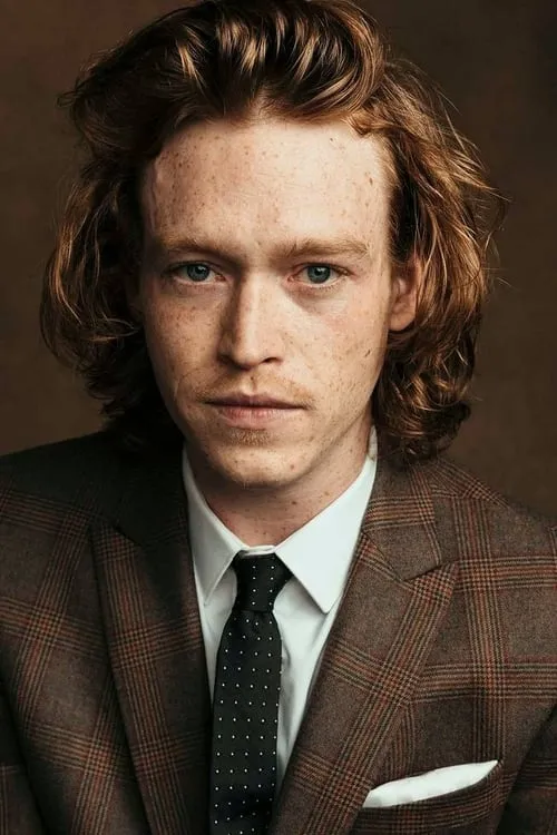 Caleb Landry Jones interpretando a Norman