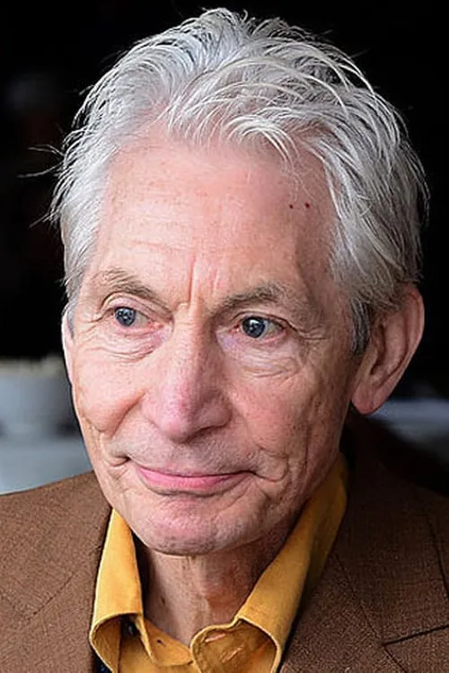 Charlie Watts interpretando a Self - The Rolling Stones Member