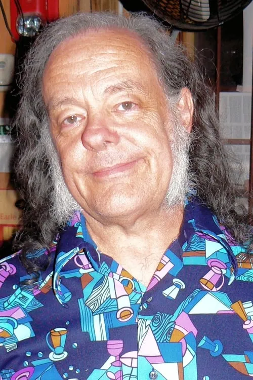 David Lindley interpretando a guitar, fiddle, vocals