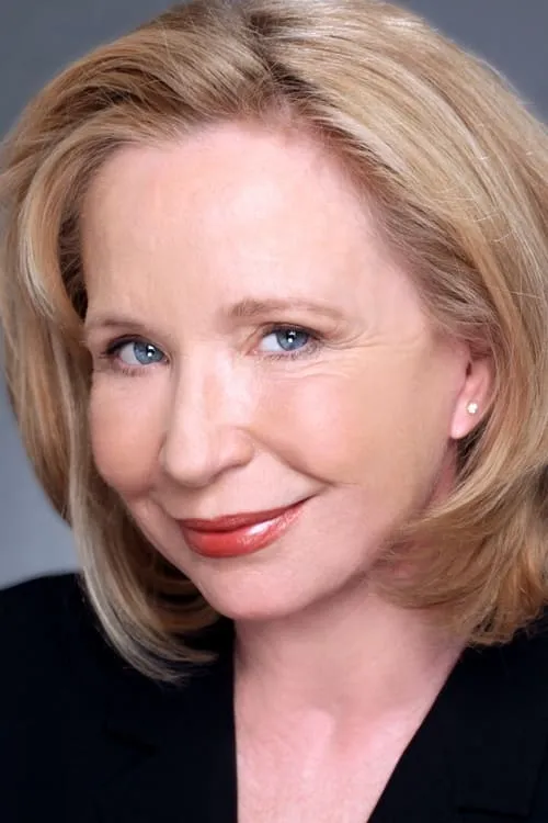 Debra Jo Rupp interpretando a Nancy Riley