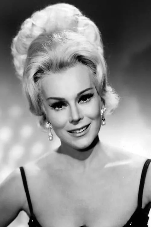 Eva Gabor interpretando a Claire Gallico Ormond