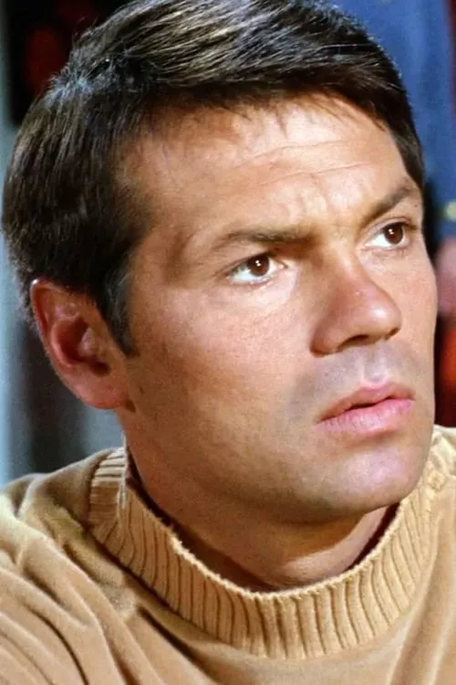 Gary Lockwood interpretando a Sir George