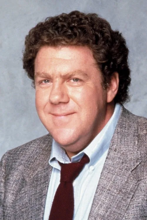 George Wendt interpretando a Shopkeeper