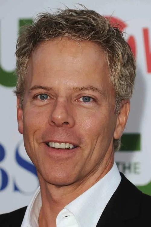 Greg Germann interpretando a Tom