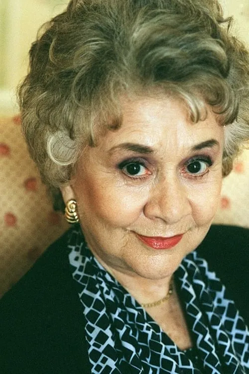 Joan Plowright interpretando a Phoebe Harkness