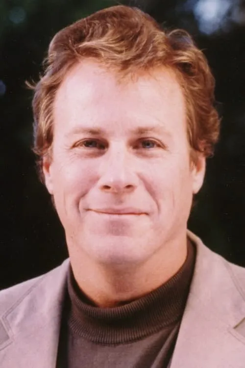 John Heard interpretando a Gregg