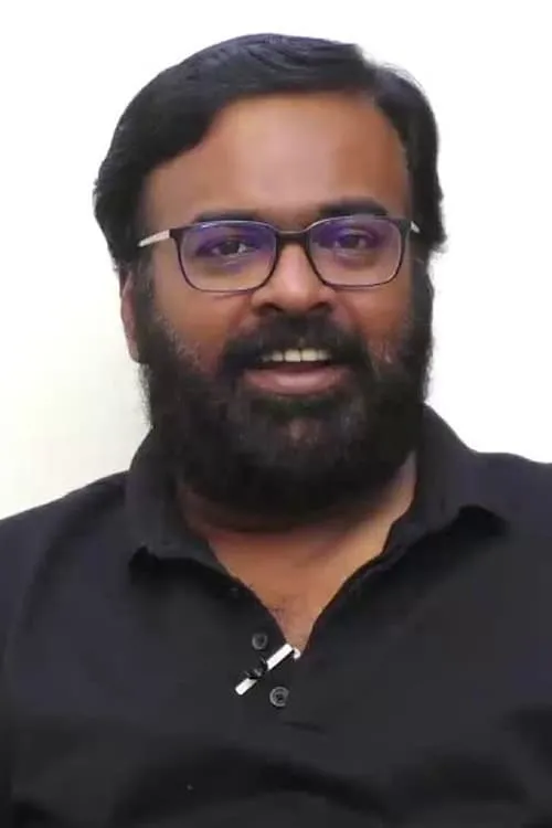 Karu Pazhaniappan interpretando a Arumugam