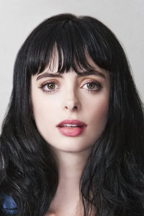 Krysten Ritter interpretando a Girl on couch