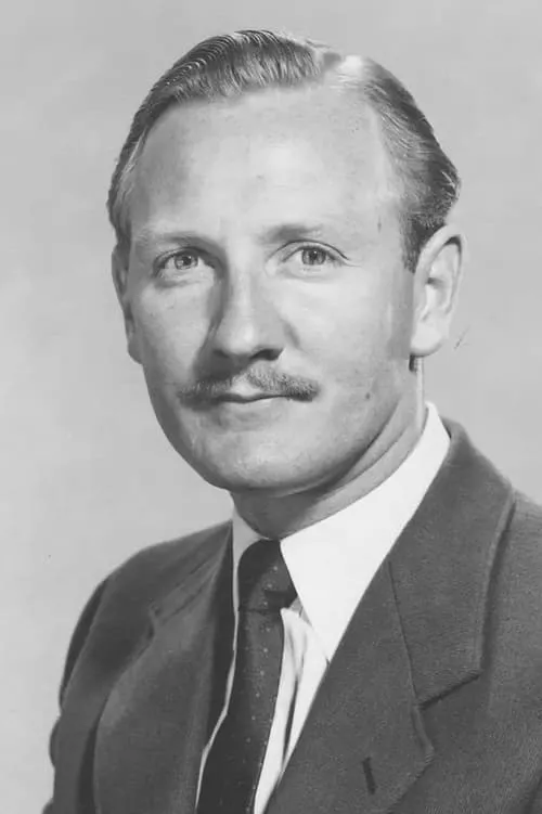 Leslie Phillips interpretando a Dr Tony Burke