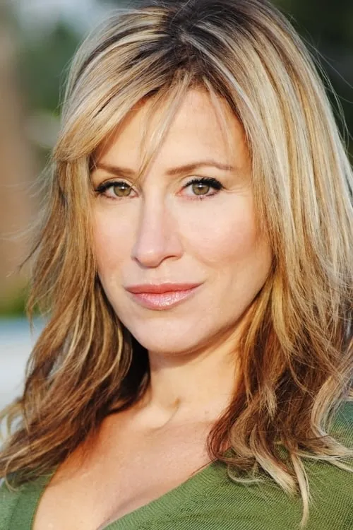 Lisa Ann Walter interpretando a Nancy Perry