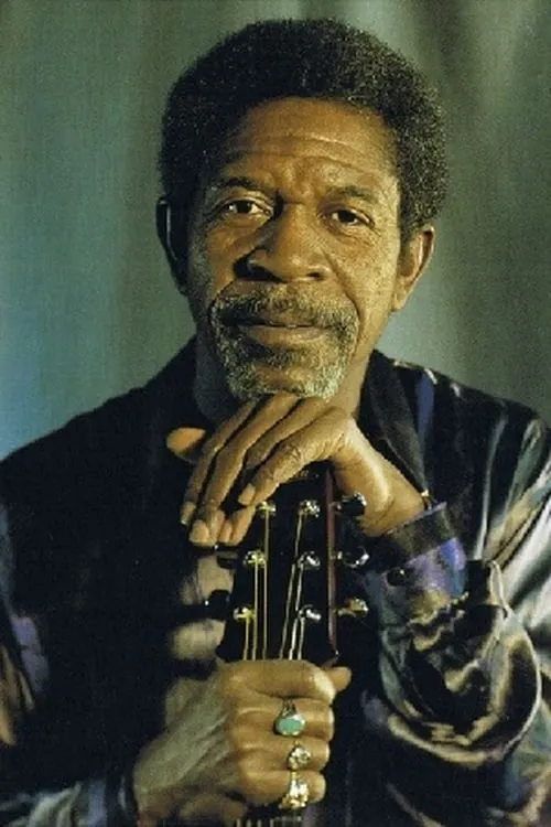 Luther Allison interpretando a Himself - Lead Guitar & Vocals