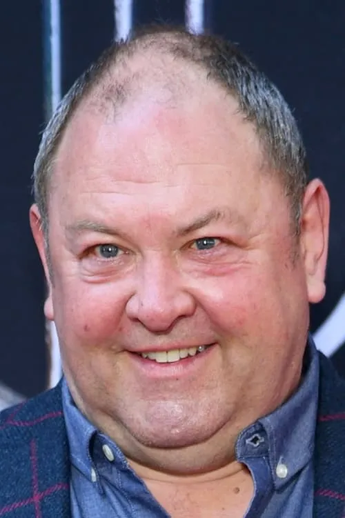 Mark Addy interpretando a Frank