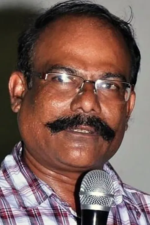 Muthu Raman interpretando a Ekambaram