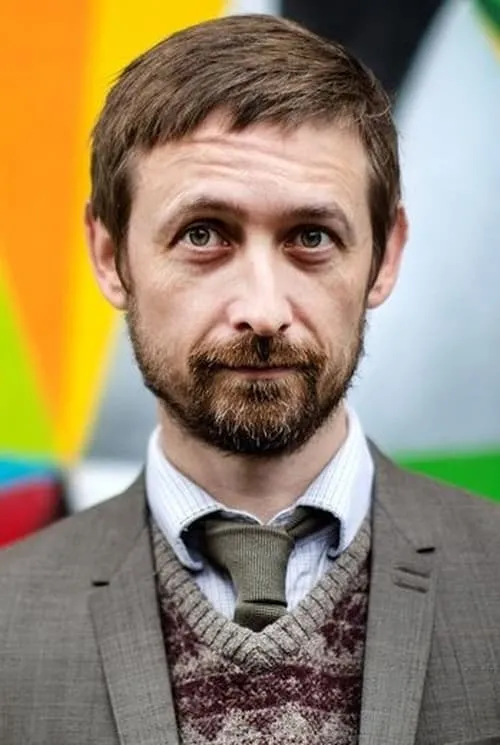 Neil Hannon interpretando a Reginald Watson (voice)