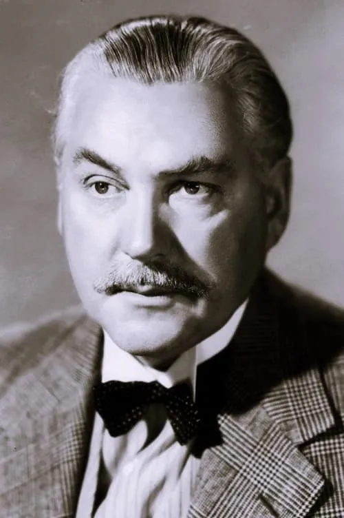 Nigel Bruce interpretando a Sir Randolph Persham