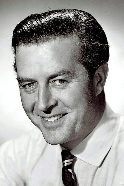 Ray Milland interpretando a Theater Patron (uncredited)