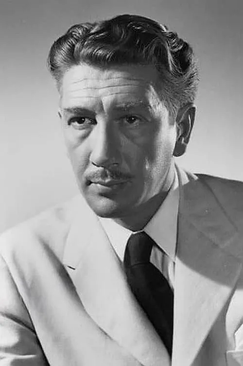 Richard Haydn interpretando a George Lockwood