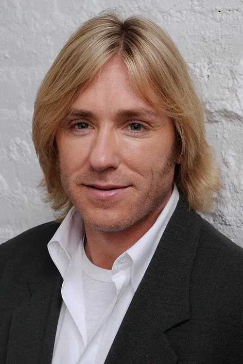 Ron Eldard interpretando a Glen Waddell