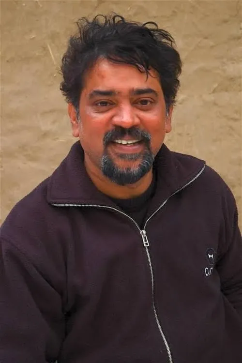 Santosh Sivan interpretando a Ravi Varma