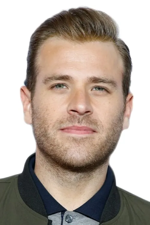 Scott Evans interpretando a Greg