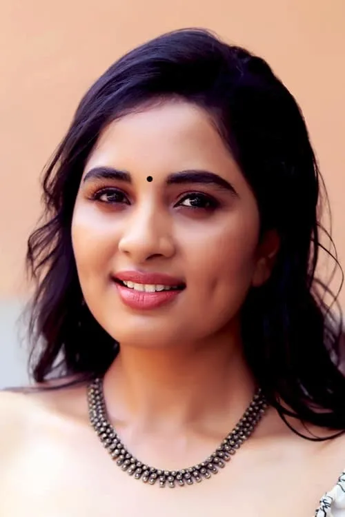 Srushti Dange interpretando a Nithya