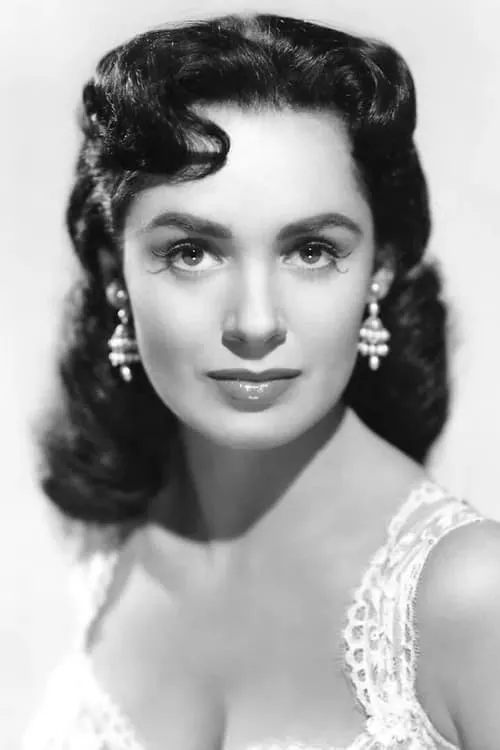 Susan Cabot interpretando a Rita Saxon