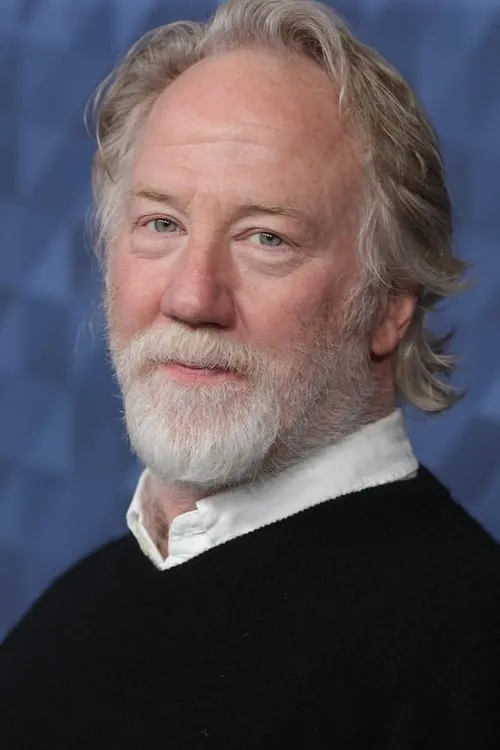 Timothy Busfield interpretando a Self