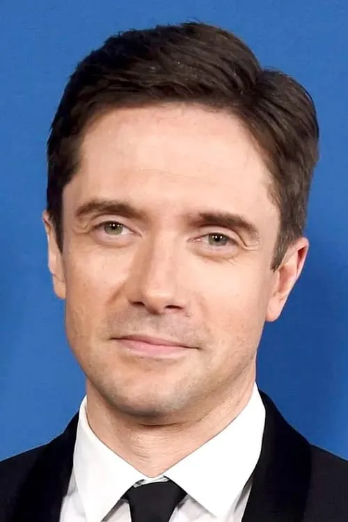 Topher Grace interpretando a Edwin