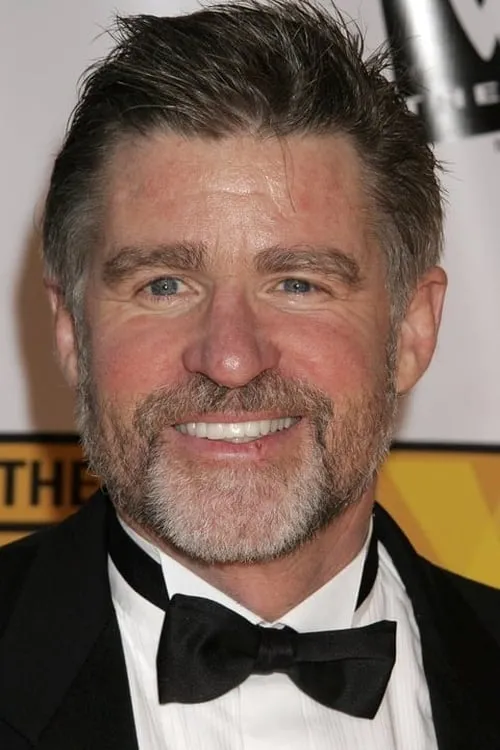 Treat Williams interpretando a Bill Mitchell