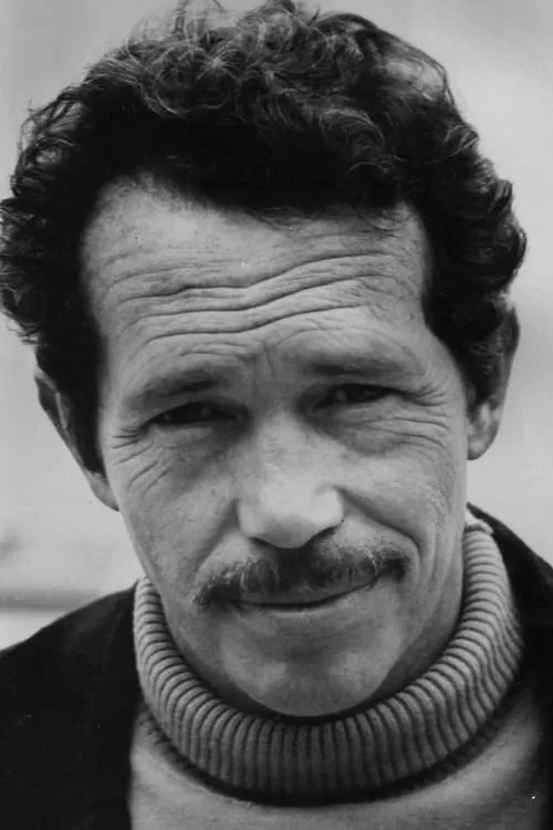 Warren Oates interpretando a Gunman