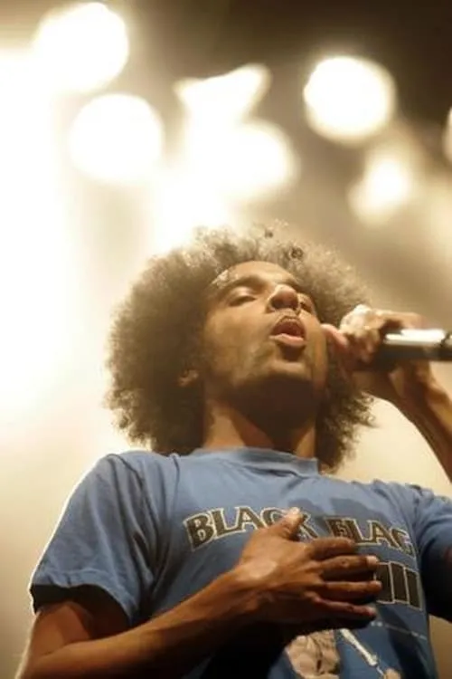 William Duvall interpretando a Vocals, Guitars