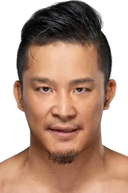 Yujiro Kushida interpretando a KUSHIDA