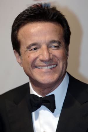 Christian De Sica interpretando a Paolo Berni