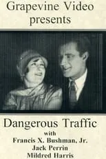 Francis X. Bushman Jr. es Ned Charters en Dangerous Traffic