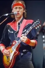 Guy Fletcher es  en Dire Straits at Live Aid