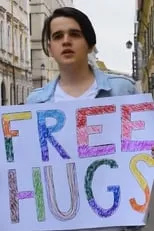 Liz Beebe interpreta a Aerobics Instructor en Free Hugs