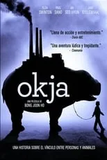 Colm Hill interpreta a Sarcastic British Reporter en Okja