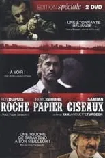 Claude Despins interpreta a Le prêtre en Roche papier ciseaux